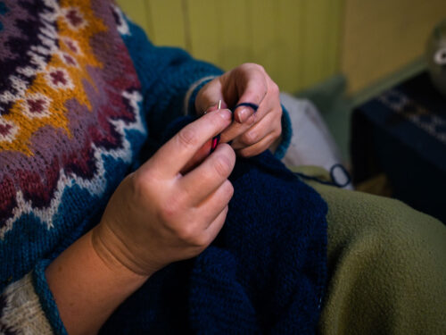 Close up of cozy knitting at Havly Lofoten Retreat, Lofoten Islands.